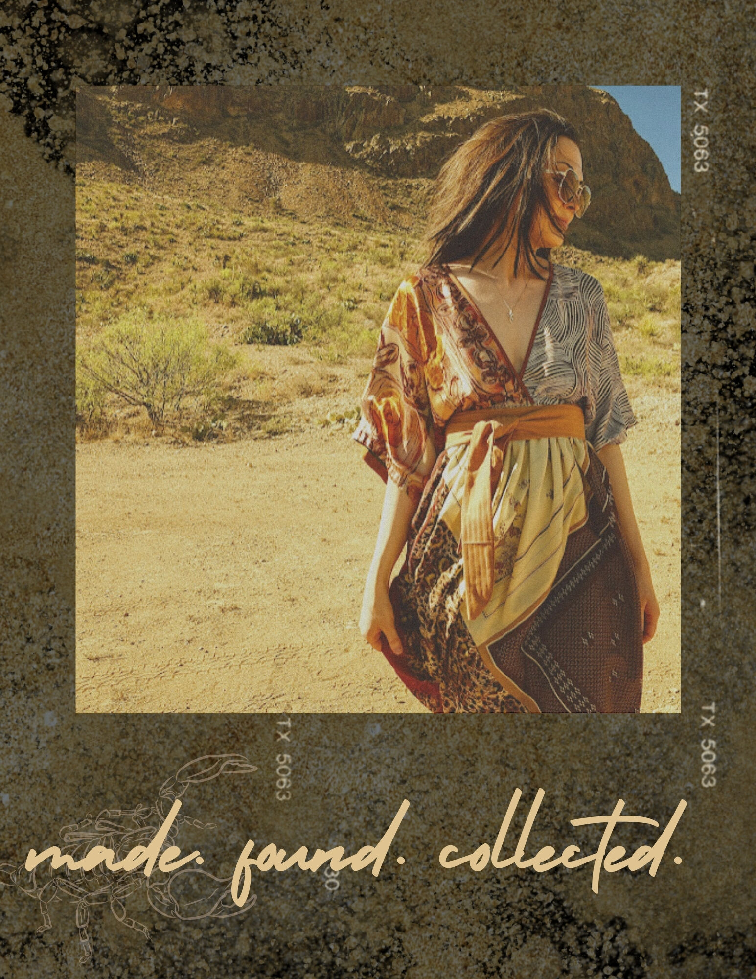 Model in the desert wearing a scarf dress.
